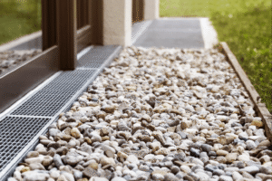 Building for Storms: How Proper Gravel Drainage Prevents Water Damage